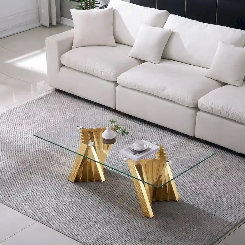 Table basse avec plateau en verre trempé et piètement en acier inoxydable finition miroir doré