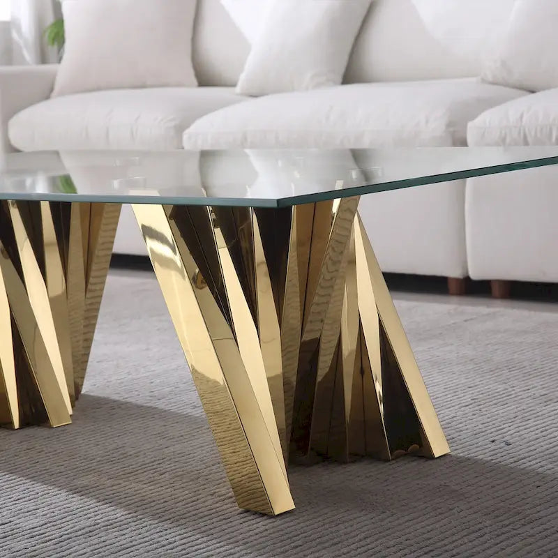 Table basse avec plateau en verre trempé et piètement en acier inoxydable finition miroir doré
