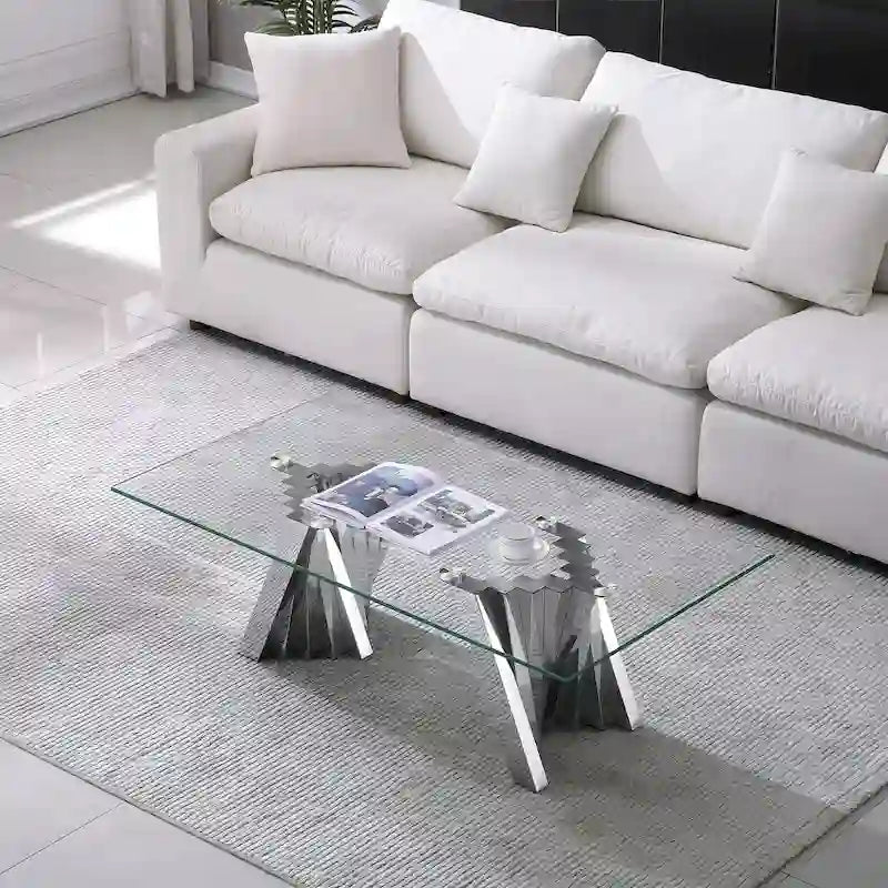 Table basse avec plateau en verre trempé et piètement en acier inoxydable finition miroir doré