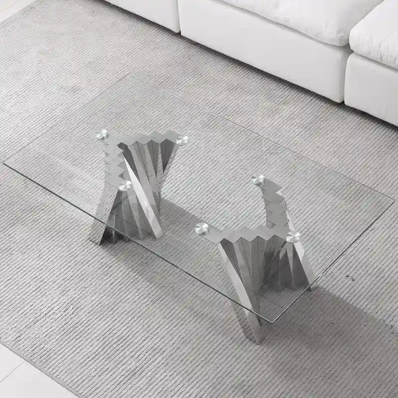 Table basse avec plateau en verre trempé et piètement en acier inoxydable finition miroir doré