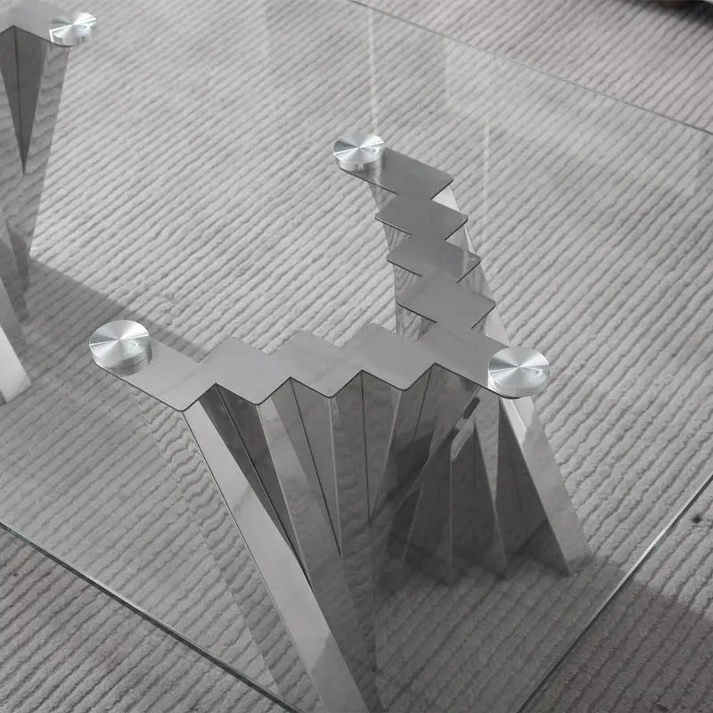 Table basse avec plateau en verre trempé et piètement en acier inoxydable finition miroir doré
