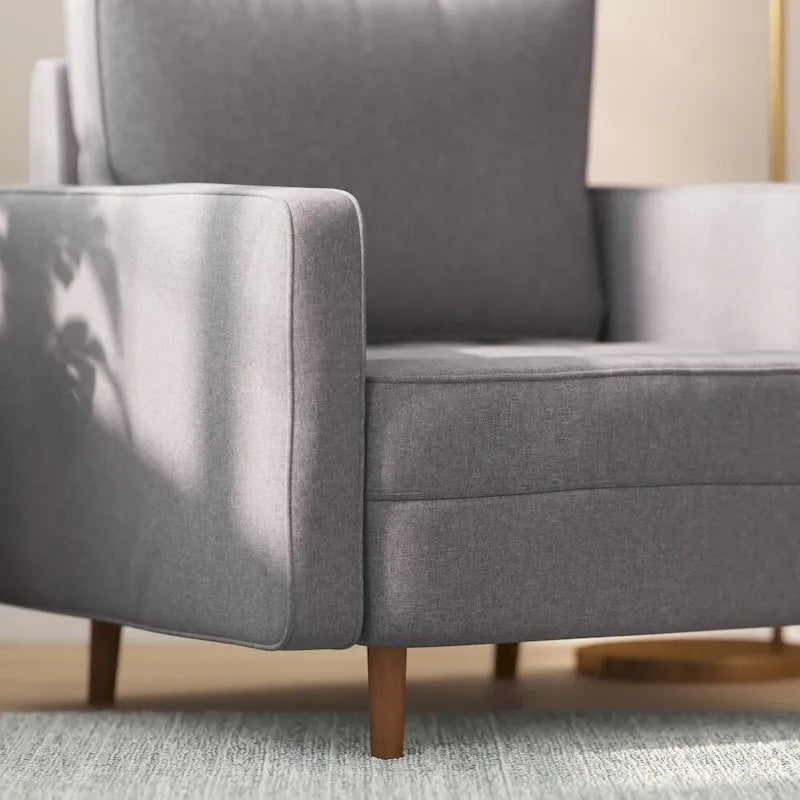 Chaise rembourrée capitonnée compacte avec pieds en bois