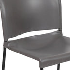 Chaise empilable ergonomique à dossier plein avec piétement luge thermolaqué, capacité de 399 kg
