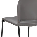 Chaise empilable ergonomique à dossier plein avec piétement luge thermolaqué, capacité de 399 kg