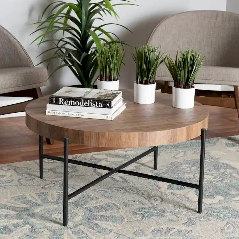 Table basse ronde industrielle | Plateau en bois de noyer marron, piétement entrecroisé en métal noir