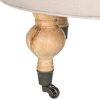 Pouf rond capitonné | Structure en bois massif | Finition chêne cérusé, lin pur, roulettes