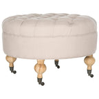 Pouf rond capitonné | Structure en bois massif | Finition chêne cérusé, lin pur, roulettes