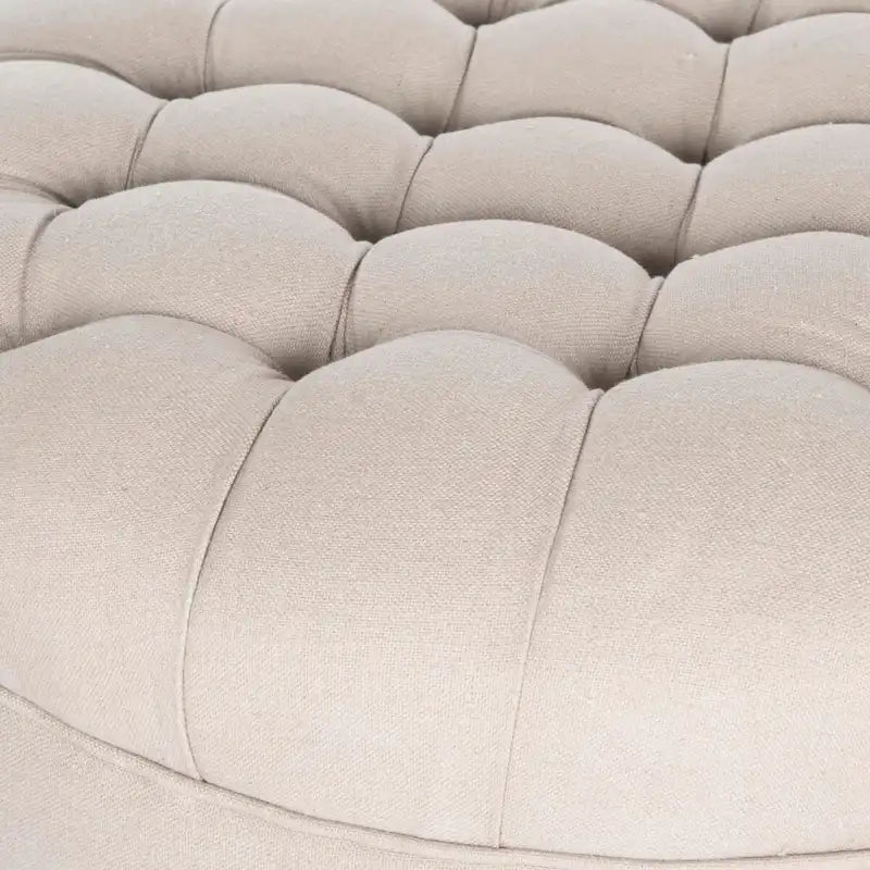 Pouf rond capitonné | Structure en bois massif | Finition chêne cérusé, lin pur, roulettes